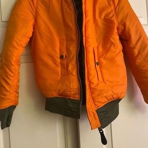 Only wear one time nice bomber jacket reversible militar green and orange